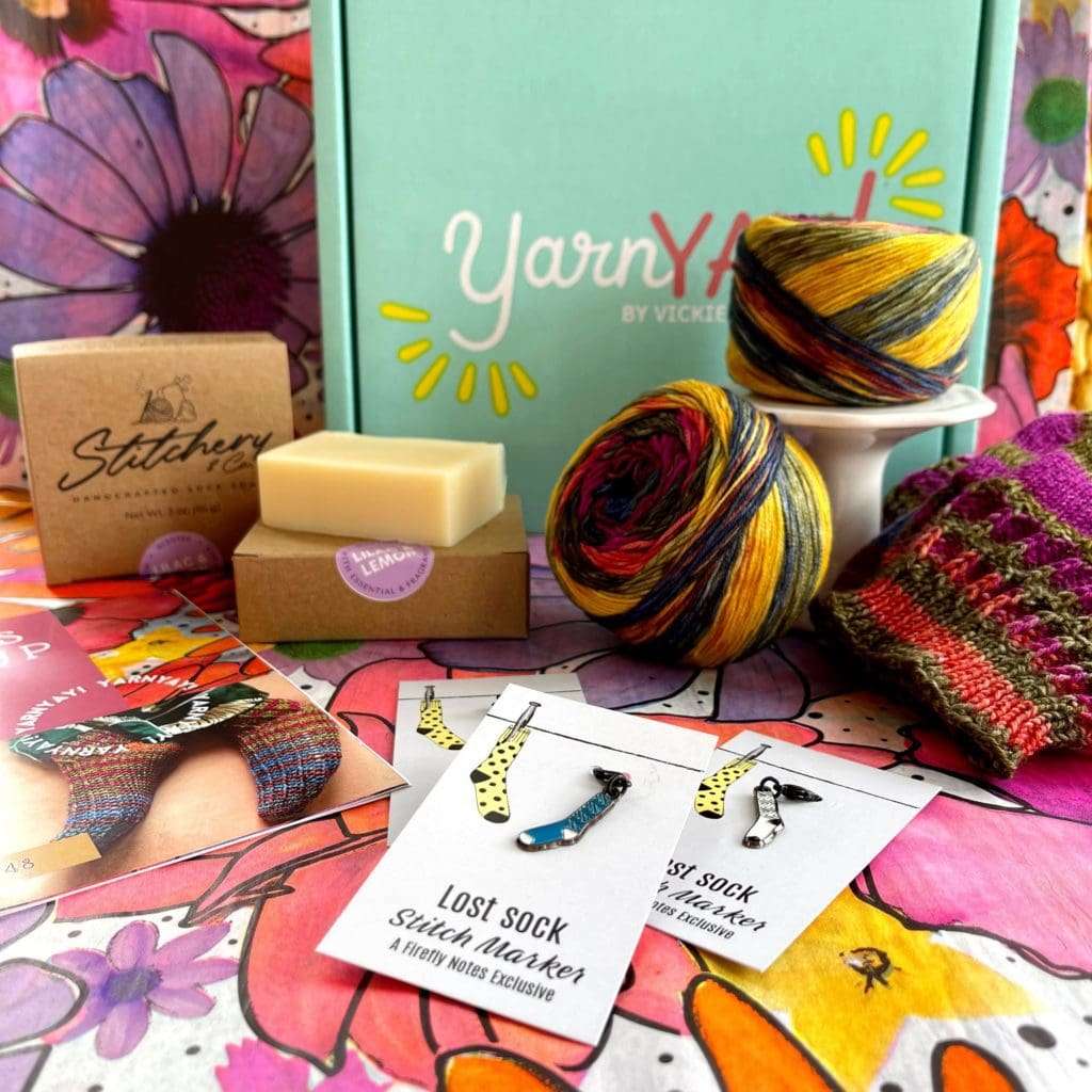 YarnYAY! April Box #48 | Featuring Urth Yarns Uneek Sock, Patterns by Vickie Howell & Julia Madill, Sock Soap by Stitchery & Co., and Lost Sock Stitch Marker by Firefly Notes